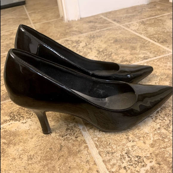 Size 9.5 black patent leather heels. Hardly worn.